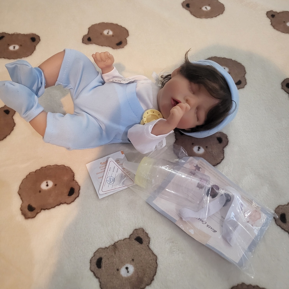 Adorable Baby Doll with Blue Outfit